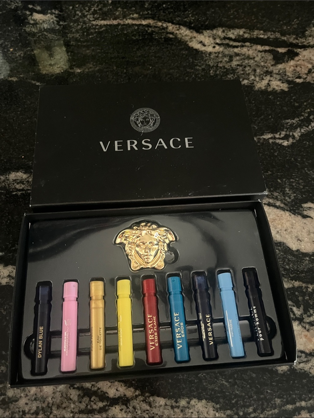 Versace colorful perfume vial set with gold Medusa accent